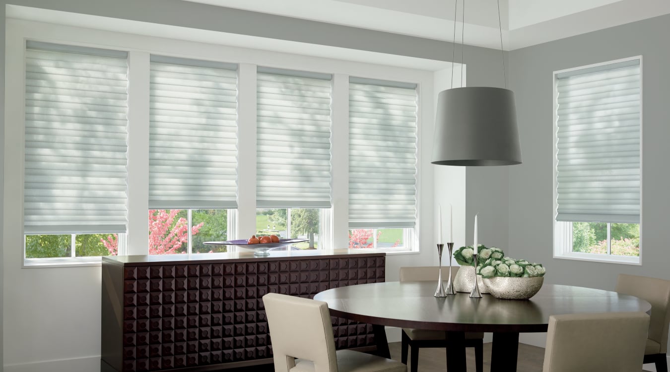 Cordless motorized shades in a Hartford dining room